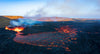 Lava flowing out of an active volcanic vent.